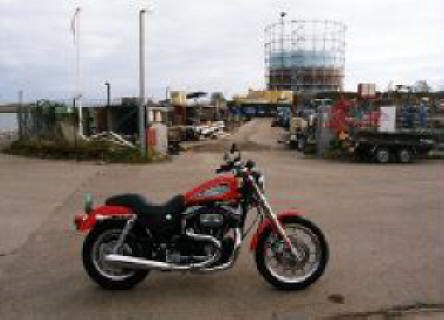 Harley-Davidson Sportster R foran klondike-milj p Amager